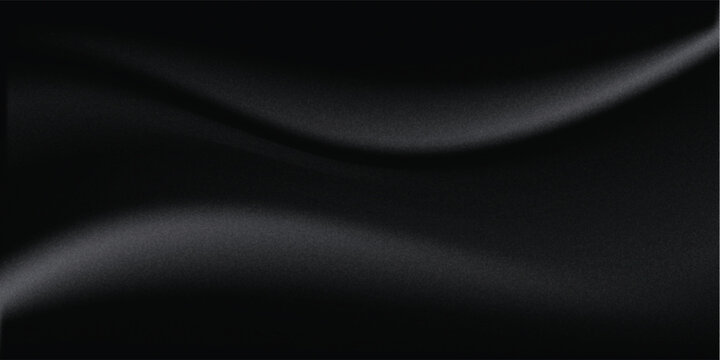 Sandblasted or brushed titanium or steel metal surface, the light reflection of the curved lines creates a smooth gradation on the dark black metallic background