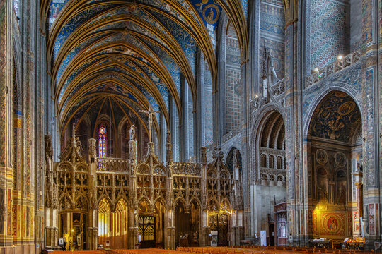 Interior view of the gothic rood screen jube inside Albi Cathedral, France. Flamboyant style art, indoor lighting