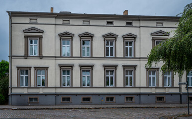 Historic residential building with decorative facade in Nauen, Brandenburg, Germany © Jrg