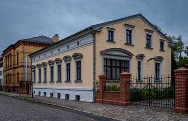 Historic buildings with neoclassical facades in Nauen, Brandenburg, Germany © Jrg