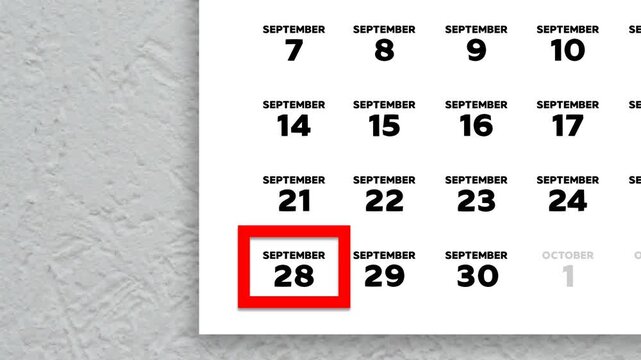Red cursor highlighting September 28th on a 2026 wall calendar page