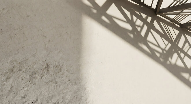 Structural steel beam shadow casting over a clean white surface with light play