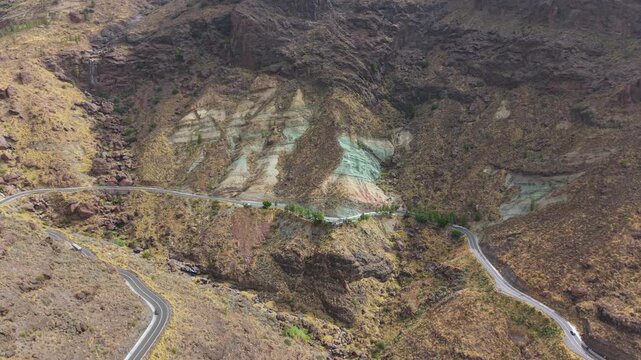 Stunning geological formation with colorful volcanic strata. Aerial view of the unique turquoise rock layers at Los Azulejos in Gran Canaria
