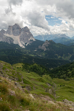 Selva di Cadore, Italy. Panoramic Dolomites mountain landscape with rugged peaks, alpine meadows and forested valleys