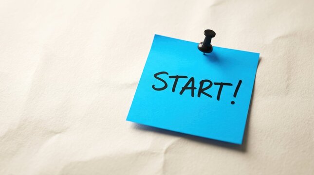 Motivational sticky note with start message