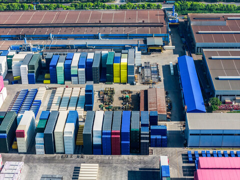 colorful shipping containers stacked in port yard
