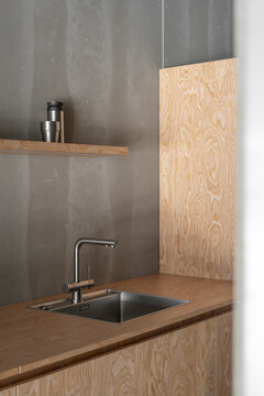 Stainless Steel Sink and Plywood Cabinet Detail