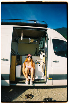Woman Sitting in camper van