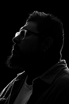 Side profile looking up in contemplation black and white
