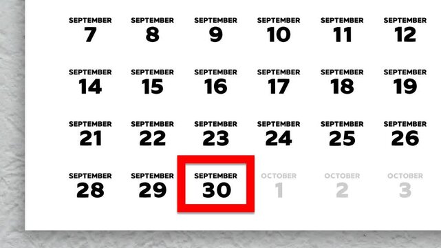 Red cursor highlighting September 30th on a 2026 wall calendar page