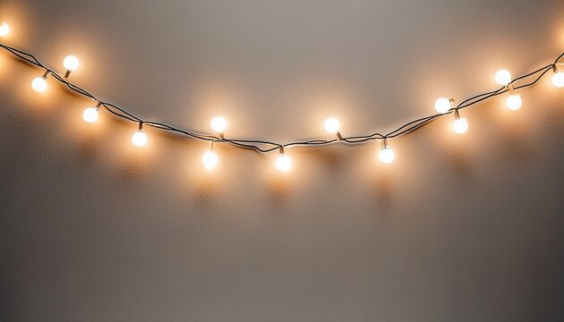 a string of warm white led fairy lights on a neutral background