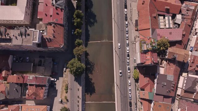 Aerial Drone Reveal Shot from Vijecnica over Miljacka River Revealing Emperors Mosque and Sarajevo City