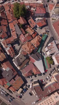Aerial Drone Reveal Shot from Vijecnica to Bascarsija Sebilj Square and Logavina Area