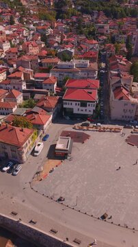 Aerial Reveal Shot from City Hall Roof over Miljacka River towards Alifakovac and Trebevic Mountain