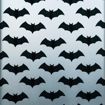 Black paper bat silhouettes in a repeating grid on a frosted glass door, featuring bright backlit daylight for seasonal packaging and backgrounds
