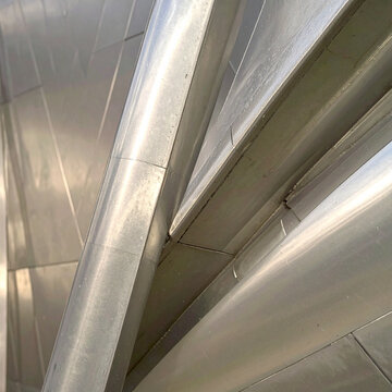 Metal Lined Corridor Receding Into the Distance