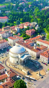 Vertical video. Turin, Italy. Flight over the city. Catholic Parish Church Gran Madre Di Dio. Drone footage, Point of interest. Rich colors