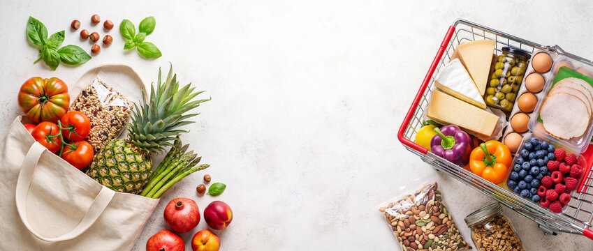 Healthy Grocery Shopping with Fresh Fruits, Vegetables and Organic Food in Reusable Shopping Bags and Cart 