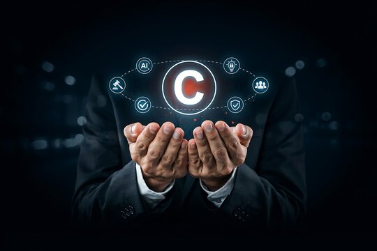 Businessman holding a copyright symbol with ai and legal icons, representing ip protection