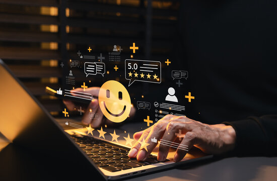 Customer satisfaction and feedback concept. Person using laptop, five star rating and smile icon for service quality, online review, customer experience, reputation, survey results, loyalty management