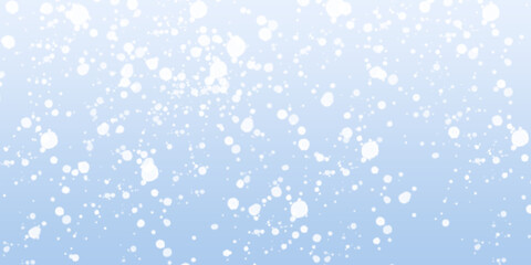 Fototapeta premium Abstract background with falling white snow or bokeh particles on a soft blue gradient backdrop, festive winter holiday design element