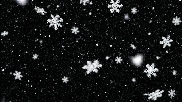Gentle snowfall drifts against a dark textured background with copy space for winter themes