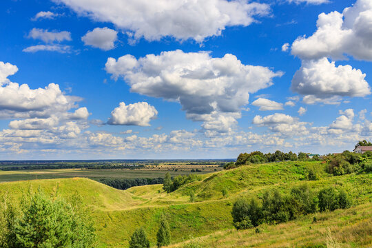 Vast open countryside with rolling hills