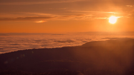 Obraz premium sunset over the clouds