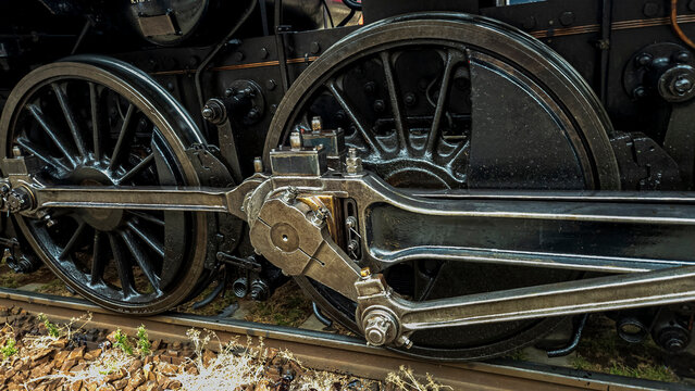 Large Spoked Wheels and Connecting Rod of Steam Locomotive