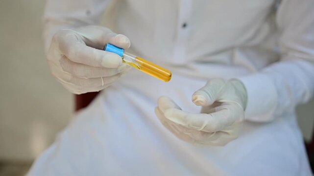 Amniotic fluid, a clear to pale yellow biological fluid surrounding the developing fetus, containing water, electrolytes, proteins, nutrients, cells, hormones, and fetal metabolites


