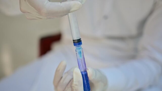 Horseshoe crab blood, a blue hemolymph containing hemocyanin, amebocytes, proteins, electrolytes, and immune components, studied in marine biology, hematology, and biomedical research

