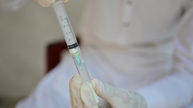 Chyluria urine specimen, milky urinary fluid containing chyle, lymph, lipids, chylomicrons, proteins, and lymphocytes, studied in clinical laboratory medicine and urinary tract diagnostics


