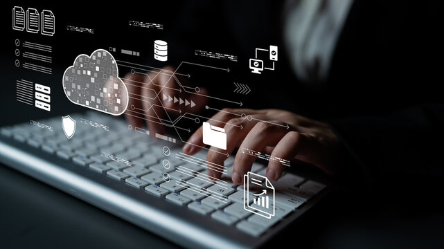 A close-up view of hands typing on a keyboard, surrounded by digital graphics representing cloud computing and data security, highlighting modern technology in a professional setting. Cyphers