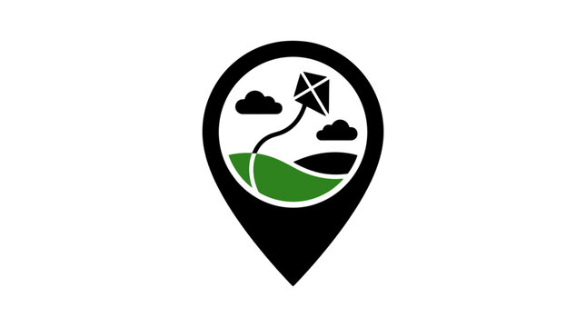 A stylized black map pin icon featuring a green landscape scene inside with a flying kite in the sky, representing a location for outdoor activities, travel, and leisure