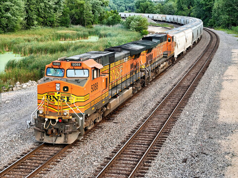 Savanna, Illinois August 16, 2026 BNSF 5088 GE C44‑9W locomotive leading a freight train along Midwestern mainline tracks