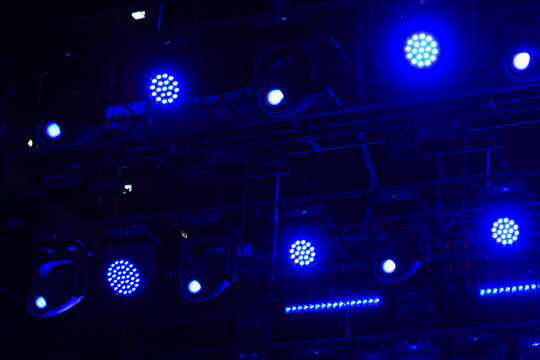Grid of blue stage lights.