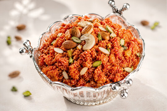 Nut Topped Gajar Halwa in an Elegant Decorative Serving Bowl