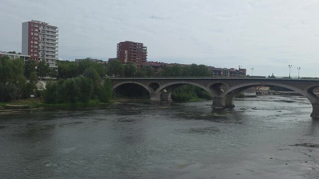 Panoramic View of the Garonne River and Historic Bridges in Toulouse, France