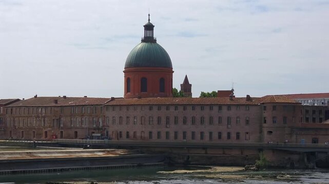 Historic La Grave Hospital and Garonne River Waterfront in Toulouse, France