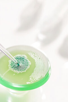 A close-up shot of a green liquid filling a glass. vertical frame