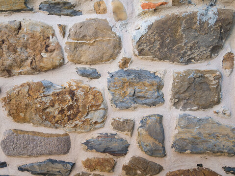 Stone wall at Avellaneda Assembly House in Bizkaia, Basque Country, Spain on a clear day