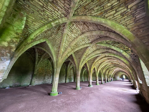 Fountains Abbey is a ruined Cistercian monastery near Ripon in North Yorkshire, England. Together with the surrounding Studley Royal Park it is a world heritage site