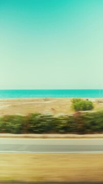 Houses in Calabria, Italy, seen from the window of a moving train