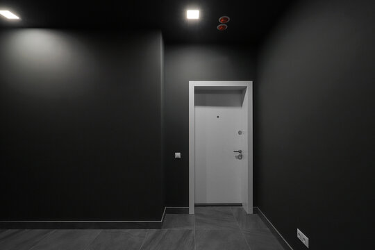 White door apartment hallway interior