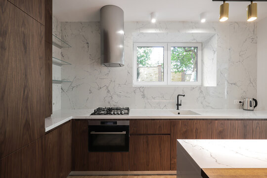 Kitchen interior with wooden cabinets