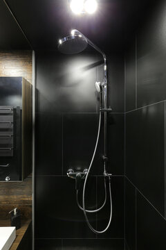 Black shower apartment bathroom interior