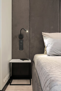 Apartment bedroom interior bedside table
