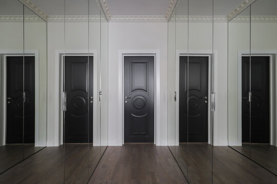Black door apartment hallway interior