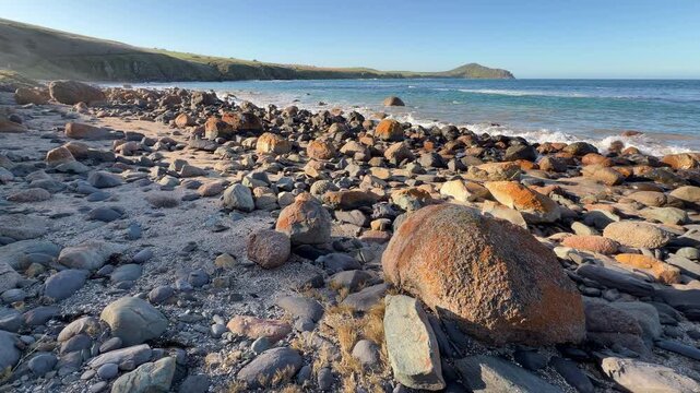 Rocks and boulders on the shore at Kings Beach in South Australia in 4k footage