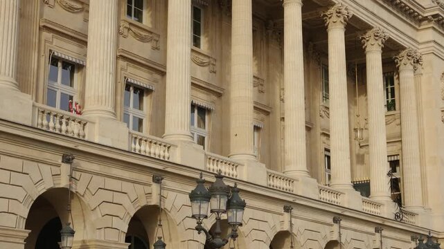 Neoclassical building facade with columns and ornate details